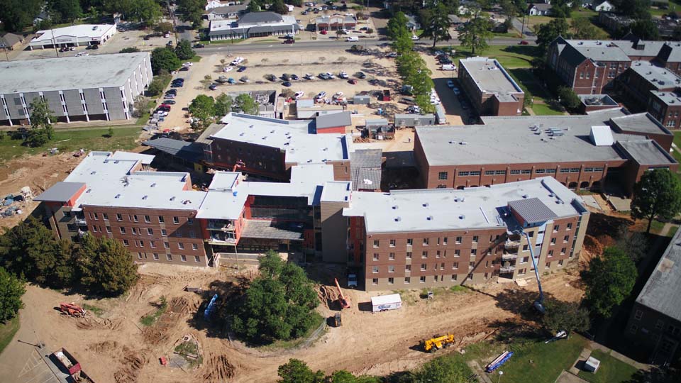 aerial photography showing building design and construction of large facility